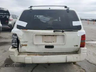 1997 Jeep Grand Cherokee Limited with VIN 1J4GX78YXVC716353, listed as a Copart auction lot 85207974 with 115,527 mi miles and Salvage Title. Bid and sale history available at carsss.com. Image 6.
