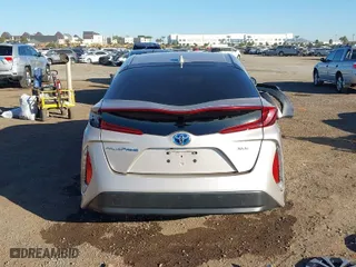 2021 Toyota Prius Prime LE with VIN JTDKAMFP1M3178179, listed as a IAAI auction lot 41233411 with 83,035 mi miles. Bid and sale history available at carsss.com. Image 17.