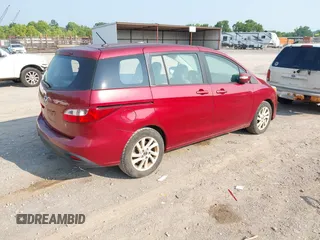 2014 Mazda 5 Sport with VIN JM1CW2BL6E0168411, listed as a IAAI auction lot 42414603 with 149,688 mi miles and . Bid and sale history available at DreamBid. Image 4.