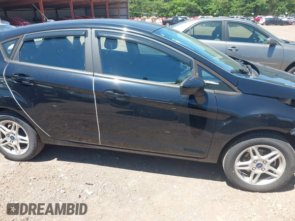 2019 Ford Fiesta SE z VIN 3FADP4EJ0KM125724, wystawiony jako IAAI lot #42320657 z przebiegiem 53 728 mil mil oraz . Historia ofert i sprzedaży dostępna na DreamBid. Obrazek 14.