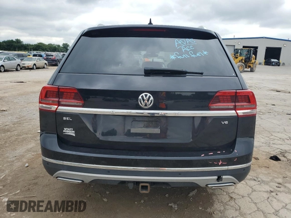 2019 Volkswagen Atlas SEL with VIN 1V2ER2CAXKC509184, listed as a Copart auction lot 58695325 with Not provided miles and Salvage title. Bid and sale history available at DreamBid. Image 6.