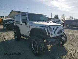2012 Jeep Wrangler Sport z VIN 1C4AJWAG3CL151885, wystawiony jako Copart lot #51682175 z przebiegiem 111 544 mil mil oraz Szkoda całkowita • Salvage title. Historia ofert i sprzedaży dostępna na DreamBid. Obrazek 12.