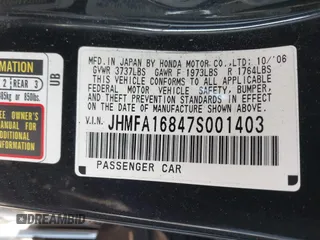 2007 Honda Civic EX with VIN JHMFA16847S001403, listed as a IAAI auction lot 42111350 with 169,340 mi miles and . Bid and sale history available at DreamBid. Image 9.