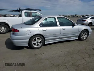 1999 Ford Contour z VIN 1FAFP68G9XK142510, wystawiony jako Copart lot #74818384 z przebiegiem 65 885 mil mil oraz Tytuł czysty. Historia ofert i sprzedaży dostępna na DreamBid. Obrazek 3.