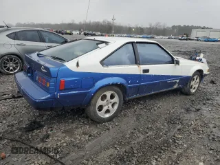 1984 Toyota Supra z VIN JT2MA67L5E0133497, wystawiony jako Copart lot #43439285 z przebiegiem 187 882 mil mil oraz Czysty tytuł • Clean title. Historia ofert i sprzedaży dostępna na DreamBid. Obrazek 3.