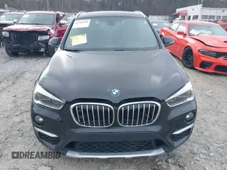 2017 BMW X1 sDrive28i with VIN WBXHU7C36HP924874, listed as a IAAI auction lot 41368396 with 113,443 mi miles. Bid and sale history available at carsss.com. Image 11.