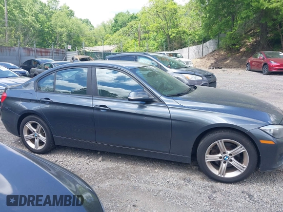 2014 BMW 3 Series 320i xDrive with VIN WBA3C3C57EP662795, listed as a IAAI auction lot 42267683 with 153,451 mi miles and . Bid and sale history available at DreamBid. Image 14.