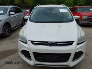 2014 Ford Escape Titanium with VIN 1FMCU0JX7EUB00220, listed as a IAAI auction lot 41945725 with 162,385 mi miles. Bid and sale history available at carsss.com. Image 6.