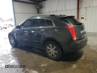 2015 Cadillac SRX z VIN 3GYFNAE34FS523702, wystawiony jako Copart lot #44706065 z przebiegiem 148 259 mil mil oraz Szkoda całkowita • Salvage title. Historia ofert i sprzedaży dostępna na DreamBid. Obrazek 2.