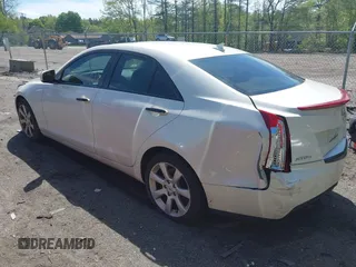 2013 Cadillac ATS with VIN 1G6AG5RX5D0178136, listed as a IAAI auction lot 42220395 with 147,066 mi miles and . Bid and sale history available at DreamBid. Image 3.
