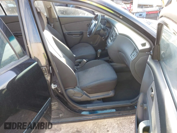 2010 Kia Rio LX with VIN KNADH4A33A6668719, listed as a IAAI auction lot 41777544 with 124,400 mi miles. Bid and sale history available at carsss.com. Image 5.