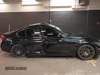 2018 BMW M3 with VIN WBS8M9C5XJ5L71599, listed as a IAAI auction lot 41932825 with 53,730 mi miles. Bid and sale history available at carsss.com. Image 13.