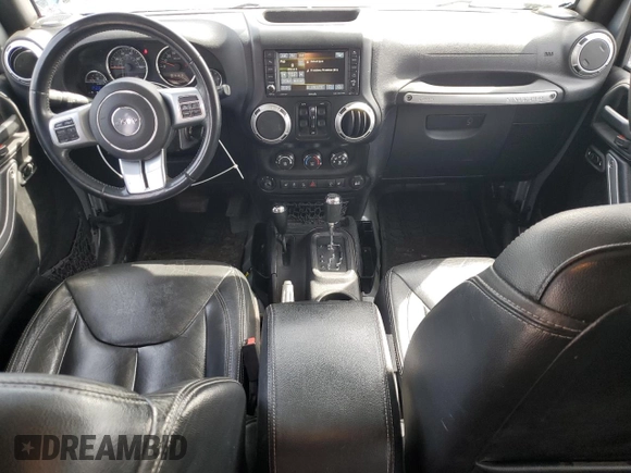 2015 Jeep Wrangler Unlimited Rubicon Hard Rock with VIN 1C4HJWFG4FL575054, listed as a Copart auction lot 51672655 with 130,405 mi miles and Clean title. Bid and sale history available at DreamBid. Image 8.