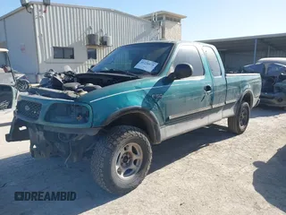 1997 Ford F-150 XL with VIN 1FTEX18L0VKC14651, listed as a IAAI auction lot 41228875 with 251,074 mi miles. Bid and sale history available at carsss.com. Image 2.