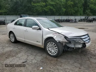 2012 Ford Fusion Hybrid с VIN 3FADP0L35CR184476, выставлен на аукционе Copart как лот 63907885 с пробегом 230 589 миль миль и Списание • Salvage title. История ставок и продаж доступна на DreamBid. Изображение 4.