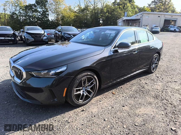 2024 BMW i5 eDrive40 with VIN WBY33FK05RCR58520, listed as a Copart auction lot 77179704 with 16 mi miles and Salvage Title. Bid and sale history available at carsss.com. Image 1.