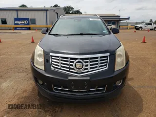 2014 Cadillac SRX Performance Collection z VIN 3GYFNCE38ES525883, wystawiony jako Copart lot #55085505 z przebiegiem 160 609 mil mil oraz Szkoda całkowita • Salvage title. Historia ofert i sprzedaży dostępna na DreamBid. Obrazek 5.