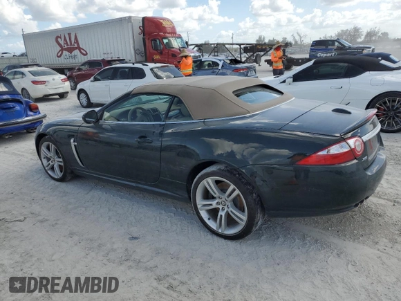 2007 Jaguar XK with VIN SAJWA44C779B12243, listed as a Copart auction lot 77239534 with Not Provided miles and Salvage Title. Bid and sale history available at carsss.com. Image 2.