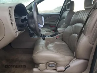 2001 Pontiac Bonneville SE z VIN 1G2HX54K414249469, wystawiony jako Copart lot #46934415 z przebiegiem 112 292 mil mil oraz Szkoda całkowita • Salvage title. Historia ofert i sprzedaży dostępna na DreamBid. Obrazek 7.