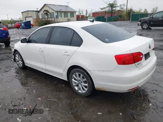 2011 Volkswagen Jetta Sedan SE w/Convenience & Sunroof PZEV with VIN 3VWDZ7AJ4BM385356, listed as a IAAI auction lot 42012728 with 169,045 mi miles. Bid and sale history available at carsss.com. Image 3.