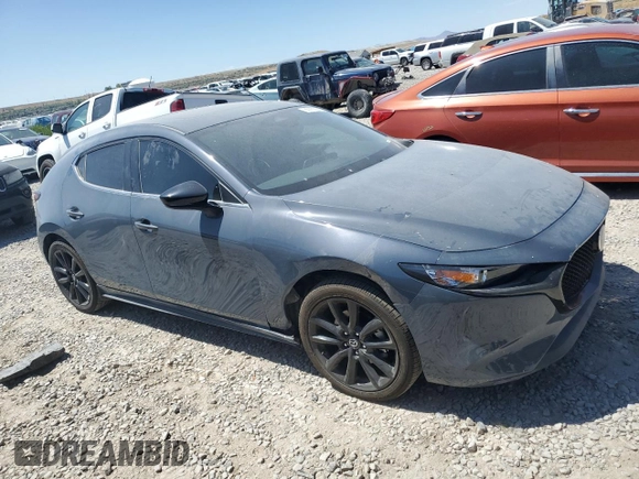 2024 Mazda 3 S Carbon Edition with VIN JM1BPBLM4R1714705, listed as a Copart auction lot 60755095 with 1,879 mi miles and Salvage title. Bid and sale history available at DreamBid. Image 4.