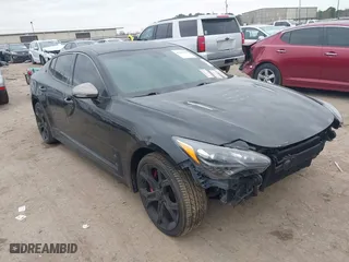 2020 Kia Stinger GT with VIN KNAE35LC2L6078391, listed as a IAAI auction lot 41409482 with 63,146 mi miles. Bid and sale history available at carsss.com. Image 1.