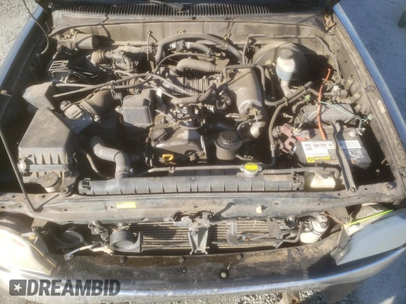 2004 Toyota Tacoma z VIN 5TEVL52N74Z451886, wystawiony jako Copart lot #52329405 z przebiegiem 240 156 mil mil oraz Szkoda całkowita • Salvage title. Historia ofert i sprzedaży dostępna na DreamBid. Obrazek 11.