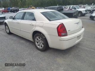2005 Chrysler 300 Touring with VIN 2C3AA53G75H663208, listed as a IAAI auction lot 42180449 with 353,034 mi miles and . Bid and sale history available at carsss.com. Image 3.