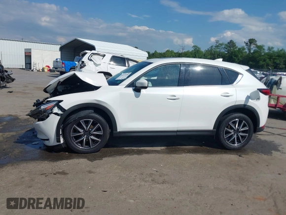 2018 Mazda CX-5 Grand Touring с VIN JM3KFBDM4J0414925, выставлен на аукционе IAAI как лот 42212109 с пробегом 86 826 миль миль и . История ставок и продаж доступна на DreamBid. Изображение 14.