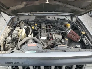 2001 Jeep Cherokee Sport z VIN 1J4FF58SX1L576572, wystawiony jako Copart lot #48982965 z przebiegiem 174 500 mil mil oraz Szkoda całkowita • Salvage title. Historia ofert i sprzedaży dostępna na DreamBid. Obrazek 13.