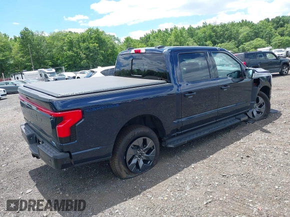2023 Ford F-150 Lightning Pro с VIN 1FT6W1EVXPWG42428, выставлен на аукционе IAAI как лот 39711091 с пробегом 6 308 миль миль и . История ставок и продаж доступна на DreamBid. Изображение 4.
