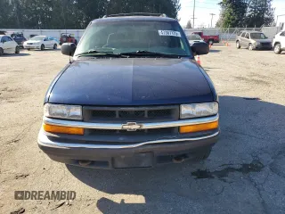 2000 Chevrolet Blazer LT z VIN 1GNDT13W8Y2119632, wystawiony jako Copart lot #47387175 z przebiegiem 140 356 mil mil oraz Szkoda całkowita • Salvage title. Historia ofert i sprzedaży dostępna na DreamBid. Obrazek 5.