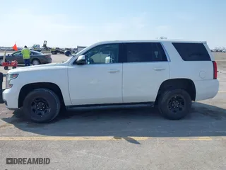2020 Chevrolet Tahoe Commercial with VIN 1GNSKDEC5LR261015, listed as a IAAI auction lot 42001083 with 110,668 mi miles. Bid and sale history available at carsss.com. Image 14.