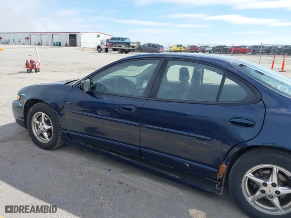 2003 Pontiac Grand Prix GT with VIN 1G2WP52K53F148801, listed as a IAAI auction lot 41888412 with 135,142 mi miles. Bid and sale history available at carsss.com. Image 13.
