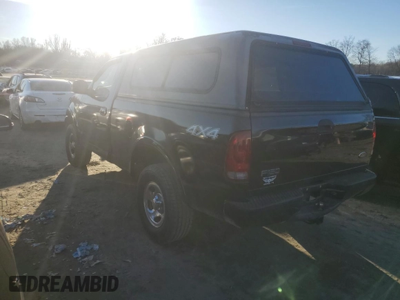 2002 Ford F-150 XL with VIN 1FTRF18232NA58109, listed as a Copart auction lot 88929065 with 148,228 mi miles and Salvage title. Bid and sale history available at DreamBid. Image 2.
