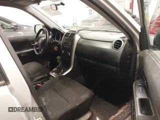2012 Suzuki Grand Vitara Premium z VIN JS3TD0D62C4100440, wystawiony jako IAAI lot #41711815 z przebiegiem 171 527 mil mil oraz . Historia ofert i sprzedaży dostępna na DreamBid. Obrazek 5.