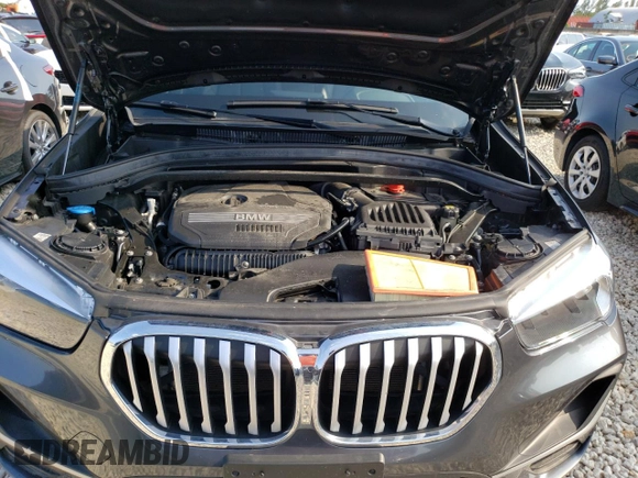 2021 BMW X1 xDrive28i with VIN WBXJG9C09M5T96327, listed as a Copart auction lot 49876493 with 42,572 mi miles and . Bid and sale history available at DreamBid. Image 12.