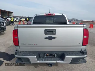 2020 Chevrolet Colorado 2WD LT with VIN 1GCGSCEN9L1142103, listed as a IAAI auction lot 41729963 with 83,180 mi miles and . Bid and sale history available at DreamBid. Image 17.
