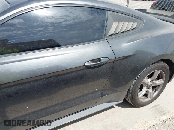 2015 Ford Mustang V6 with VIN 1FA6P8AM6F5369629, listed as a IAAI auction lot 42056978 with 111,083 mi miles and . Bid and sale history available at DreamBid. Image 15.
