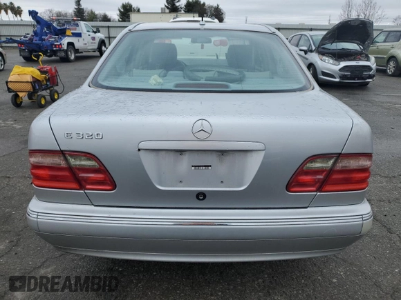 2002 Mercedes-Benz E-Class with VIN WDBJF65J02B446887, listed as a Copart auction lot 44057675 with 252,388 mi miles and Clean Title. Bid and sale history available at carsss.com. Image 6.