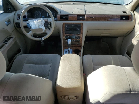 2005 Ford Five Hundred SEL with VIN 1FAFP24105G133141, listed as a Copart auction lot 74682914 with 230,411 mi miles and Salvage Title. Bid and sale history available at carsss.com. Image 8.