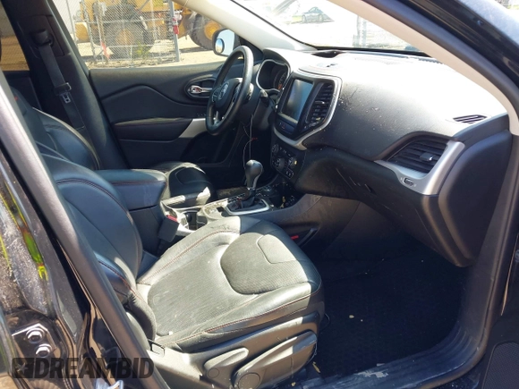 2018 Jeep Cherokee Trailhawk Leather Plus with VIN 1C4PJMBXXJD572667, listed as a IAAI auction lot 42216477 with 85,890 mi miles and . Bid and sale history available at DreamBid. Image 5.
