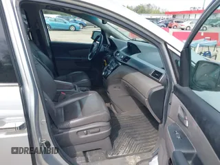 2012 Honda Odyssey Touring with VIN 5FNRL5H92CB055473, listed as a IAAI auction lot 42128601 with 163,901 mi miles. Bid and sale history available at carsss.com. Image 5.