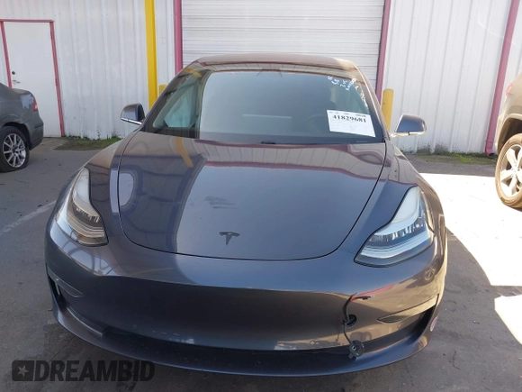 2018 Tesla Model 3 Long Range Battery with VIN 5YJ3E1EA7JF163401, listed as a IAAI auction lot 41829681 with 90,065 mi miles. Bid and sale history available at carsss.com. Image 11.