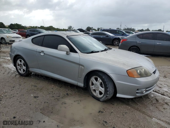 2003 Hyundai Tiburon GT with VIN KMHHN65F23U084299, listed as a Copart auction lot 75105394 with 90,598 mi miles and Clean Title. Bid and sale history available at carsss.com. Image 4.