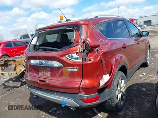 2015 Ford Escape Titanium with VIN 1FMCU0JX8FUA89049, listed as a IAAI auction lot 41988611 with 277,003 mi miles. Bid and sale history available at carsss.com. Image 4.
