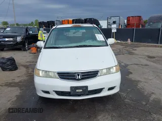 2004 Honda Odyssey EX-L with VIN 5FNRL18074B109717, listed as a IAAI auction lot 37731273 with 314,449 mi miles and . Bid and sale history available at DreamBid. Image 12.