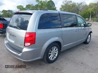 2018 Dodge Grand Caravan SXT z VIN 2C4RDGCG4JR179115, wystawiony jako IAAI lot #41163101 z przebiegiem 107 258 mil mil oraz . Historia ofert i sprzedaży dostępna na DreamBid. Obrazek 4.