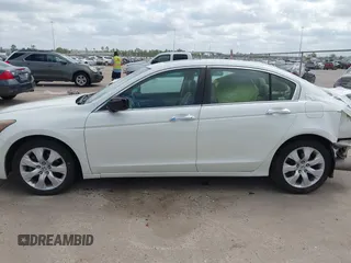 2009 Honda Accord EX-L with VIN 1HGCP36819A011542, listed as a IAAI auction lot 41764124 with 124,455 mi miles and . Bid and sale history available at DreamBid. Image 15.