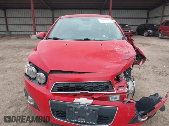 2012 Chevrolet Sonic LT with VIN 1G1JC5SH7C4133484, listed as a IAAI auction lot 42076809 with 100,506 mi miles and . Bid and sale history available at DreamBid. Image 12.